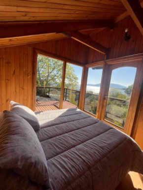 Escape to Our Cosy Wooden Cabin on Lake Calafquén